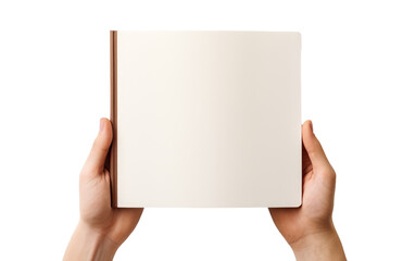 Obraz premium A person is shown holding a blank book in their hands. The individuals hands are visible, grasping onto the book with an open cover.