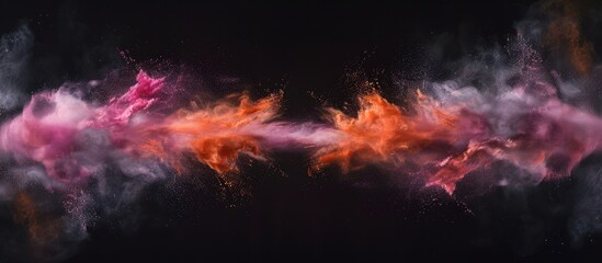 The vibrant hues of pink and orange burst forth against the stark black backdrop, creating a...