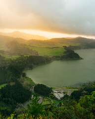 Sunrise at the crater lake Lagoa das Furnas in the volcanic caldera on Sao Miguel island (Azores, Portugal)