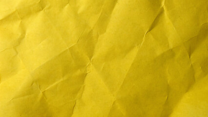 Yellow crumpled paper texture, pattern backdrop