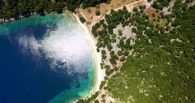Foki beach with clear turquoise waters, kefalonia, greece, sunny day, aerial view
