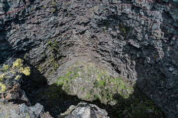 Devils Throat. Hawaiʻi Volcanoes National Park. Chain of Craters Rd. pit craters are depressions that form primarily as the earth fractures when a volcano shifts or expands. 