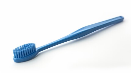 A blue plastic toothbrush captured in top view, sideways, and lengthwise orientations against a white background - obrazy, fototapety, plakaty