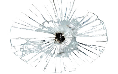 A piece of glass displaying intricate patterns of shattered lines and fragments, likely resulting from impact or force applied to the surface.