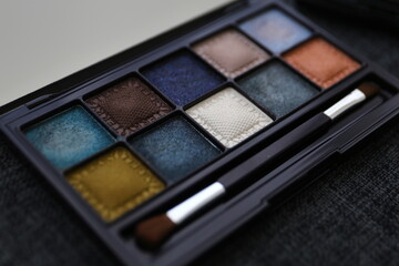 Detail of cool-toned eyeshadow compact