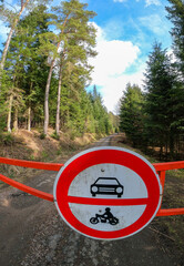 No motor vehicles sign in Leluchowskie Mountains, near Osly Mountain in spring