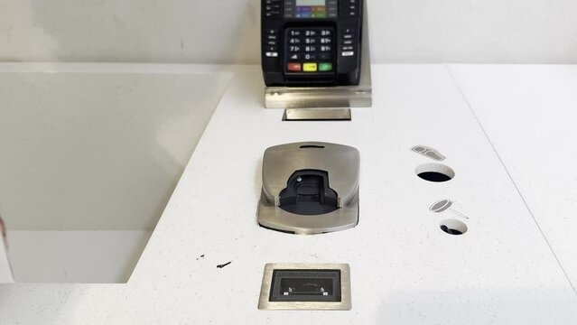 buying make up at cosmetics section in store,self checkout systems in  retail stores,Barcode scanner,Self checkout machine