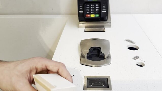 buying make up at cosmetics section in store,self checkout systems in  retail stores,Barcode scanner,Self checkout machine