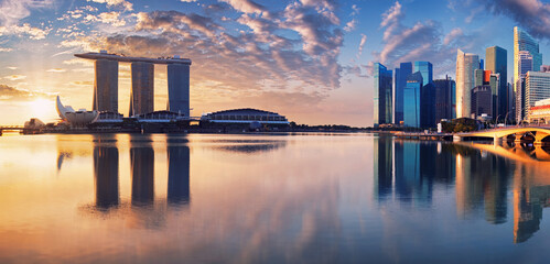 Singapore city skyline at sunset  with bridge