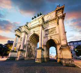 Dramatic sunset over Siegestor - Victory Gate  arch in downtown Munich, Germany - 747917380