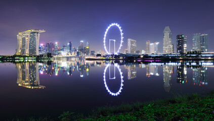 Panoramic image of Singapore skyline at night. - 747917775