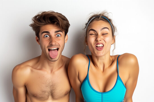 Funny young couple making funny and silly face with tongue sticked out. Studio Background for best Image for Marketing, Sale, Promotion or Advertising Campaign.