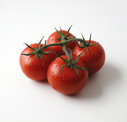 Fresh tomatoes on the vine with drops of water - healthy vegetables and healthy eating