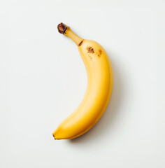 Yellow ripe banana on a white background - superfood with lots of vitamins - 747920594