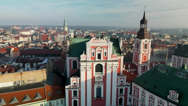 Baroque Collegiate Church of Our Lady of Perpetual Help and Mary Magdalene and panorama of Old Market Square in the Old town, Poznan, Poland. Aerial view.