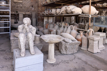 Plaster cast of human body of victim the eruption of the volcano Vesuvius in 79 AD near Naples, Pompeii, Italy