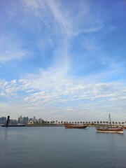 view of the city Doha with clouds and blue sky 