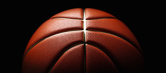 Image of a basketball on a black background. The lighting is beautifully arranged.