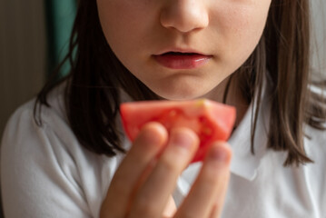 Child Eating Tomato: Close-Up of Mouth