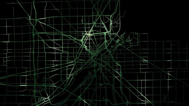 Zoom in road map of Toledo Ohio with green glowing roads on a black background.