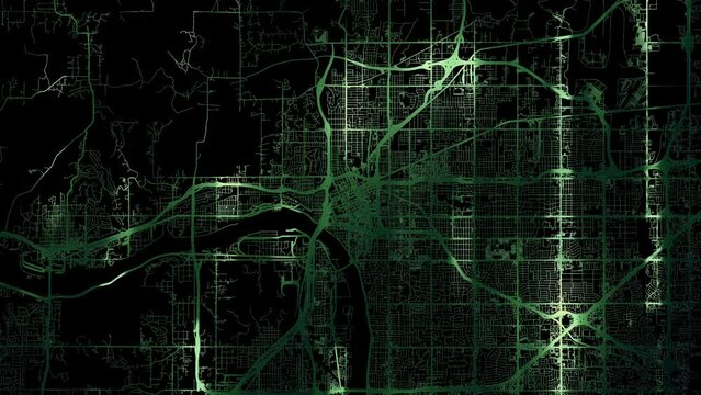 Zoom in road map of Tulsa Oklahoma with green glowing roads on a black background.