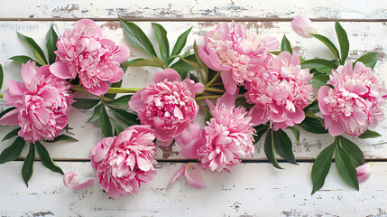 Postcard with fresh peony flowers on white wooden