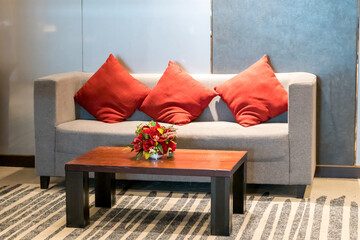 Red pillow on sofa decoration in living room interior
