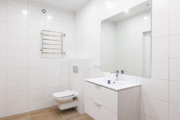 modern bathroom room with toilet and washing machine