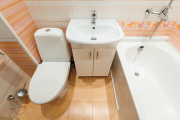 modern bathroom room with toilet and washing machine