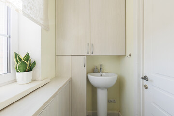 modern bathroom room with toilet and washing machine