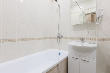 modern bathroom room with toilet and washing machine