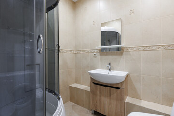 modern bathroom room with toilet and washing machine