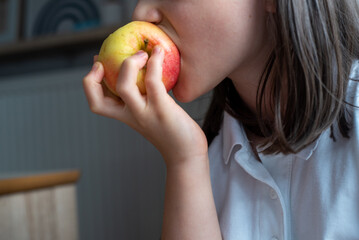 Child Eating Apple: Close-Up of Mouth