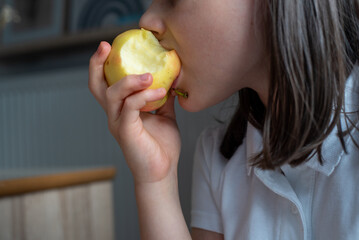 Child Eating Apple: Close-Up of Mouth