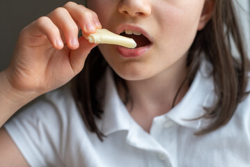 Child Eating Cheese: Close-Up