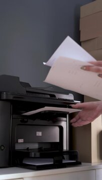 Woman Using Copy machine in Office, Office Worker Using Copy machine, Vertical Video