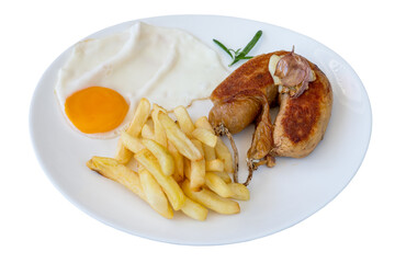 Breakfast of fried American eggs with sausage potatoes garlic and spiced greens. On a white isolated background.