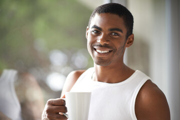 Black man, portrait and window with coffee for morning, breakfast start or ambition at home. Face...