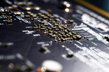 Motherboard chip panel with ICs, various zippers in a shallow depth of field that is sharp and...