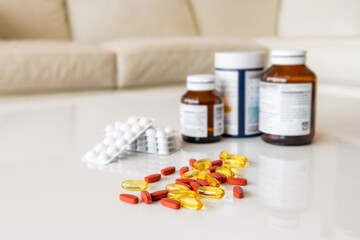 Medicine pills, drugs in different colours arranged on a white background. Health care medical...