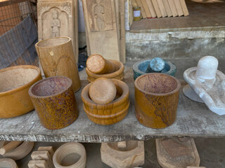 hamam dasta or mortar and pestle and cup made from jaisalmer yellow stone. It is specifically made...