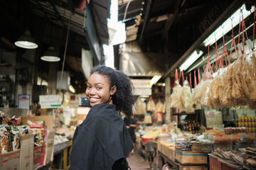 Asian woman enjoy travel in  downtown district