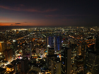 Night view of cars and vehicles on highway. Makati Skyline. Metro Manila. Philippines.