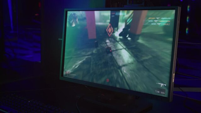 Killing the opponents in the internet shooter computer game. Winning the round of the shooter computer game match. Defusing the enemy terrorist bomb in the multiplayer shooter computer game. FPS.
