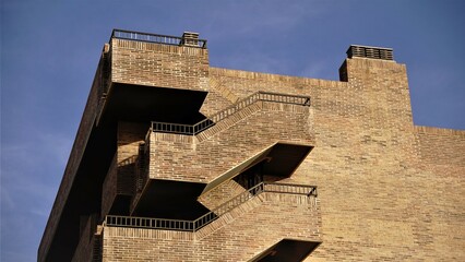 modern brick facade with exterior stairwell