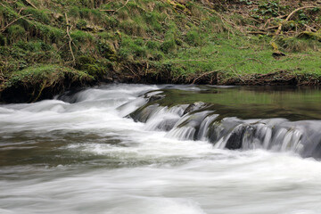 Closeup of a section of a waterfall on the River Dove, Derbyshire England