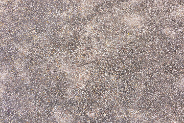 Background Abstract texture. Pebbles small or gravel color black, brown attached with beautiful cement concrete. Natural pattern used to make wallpaper website along walls of houses, building.