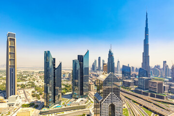 Naklejka na ściany i meble Amazing skyline cityscape with modern skyscrapers. Downtown of Dubai at sunny day, United Arab Emirates.