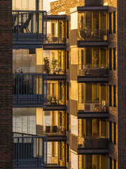 Sunset Glow on Modern Balconies in Gothenburg, Sweden, Overlooking the River