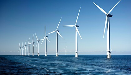 White wind turbines in offshore farm harnessing nature s power in blue waters under expansive skies.